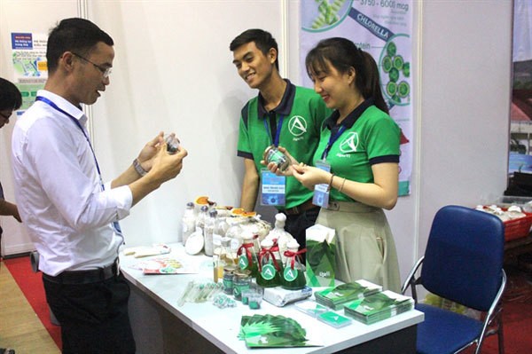 An exhibition stand displays products made from various algae species at Da Nang's Teachers College. Central Vietnam has favourable conditions for growing algae for wide uses on farms, pollution treatment, bio-fuel and pharmaceutical production. Photo courtesy of Trinh Dang Mau