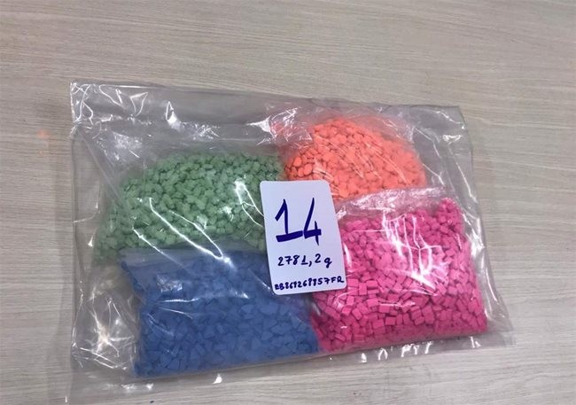 Ecstasy pills sent from Europe are seized by HCMC law enforcement. The HCMC Department of Customs has confiscated over 18 kilograms of ecstasy pills and marijuana hidden in packages sent from Europe to Vietnam – PHOTO: HCMC DEPARTMENT OF CUSTOMS