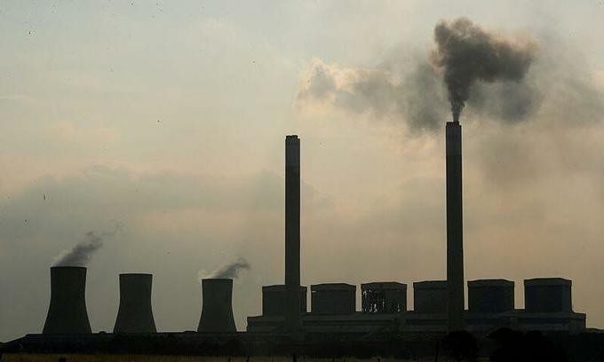 Smoke rises from the Duvha coal-based power station owned by state power utility Eskom, in Mpumalanga province, South Africa, February 18, 2020. Photo by Reuters/Mike Hutchings.