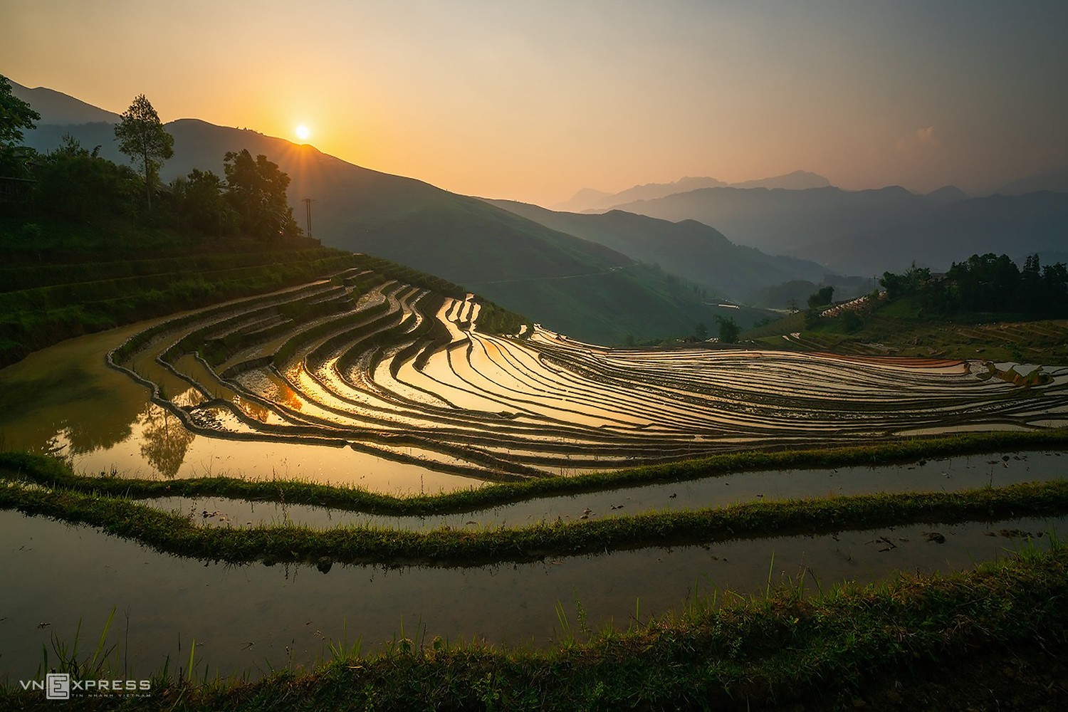 Waterlogged terraced rice fields during summer are a tourist specialty of the northern mountainous region.

Farmers typical flood their fields soon after the first summer rains and start transplanting rice seedlings for the new crop. Watering season lasts from late May to the end of June.