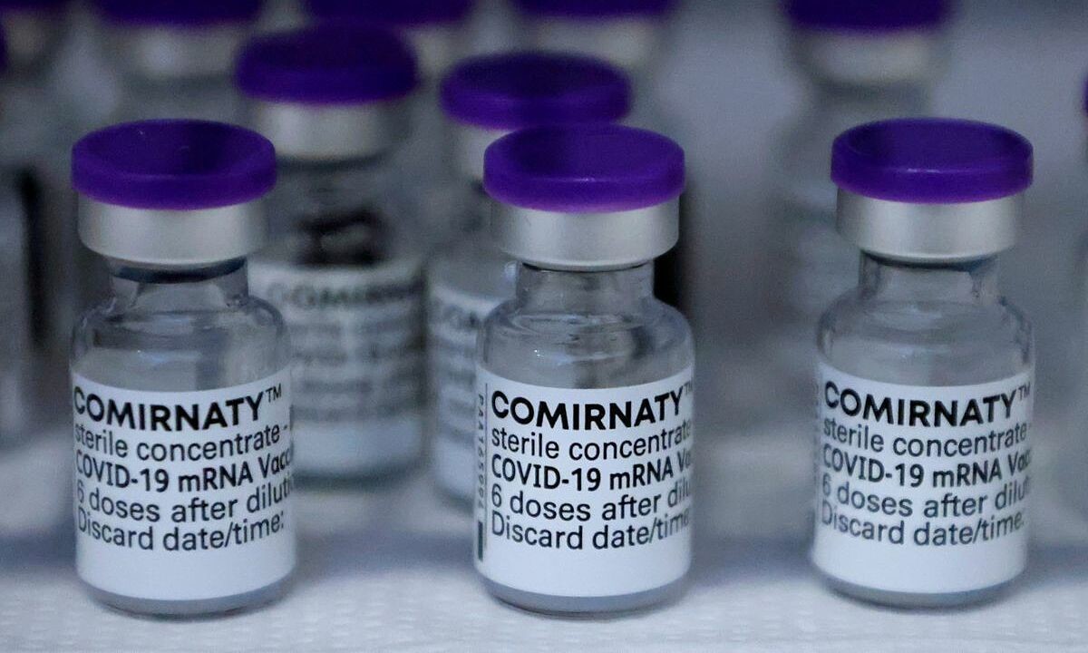 Vials of the Pfizer-BioNTech Comirnaty coronavirus disease (Covid-19) vaccine are pictured in a general practitioners practice in Berlin, Germany, April 10, 2021. Photo by Reuters/Fabrizio Bensch.