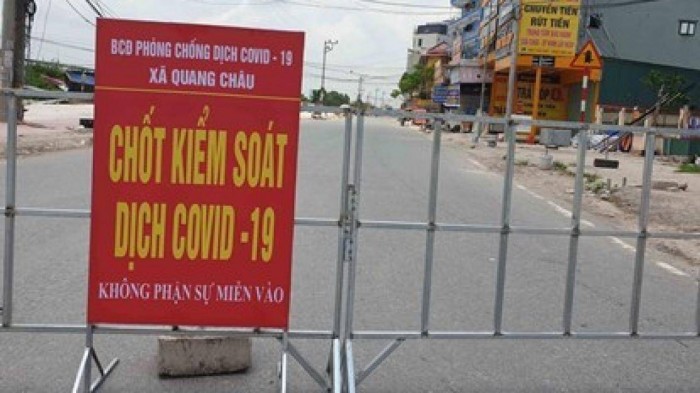 Một chốt kiểm soát phòng dịch Covid-19 tại huyện Việt Yên, Bắc Giang.