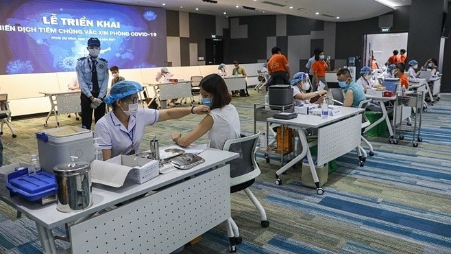 Not time yet for Vietnam to 'live with' Covid: experts