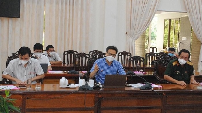 Deputy Prime Minister Vu Duc Dam (C) speaking at a meeting with An Giang provincial leaders on August 8. (Photo: NDO/Thanh Dung)