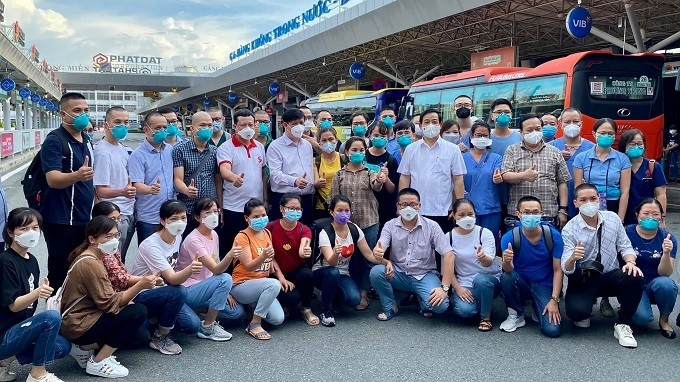 Minister of Health Nguyen Thanh Long, along with doctors, nurses and technicians supporting Ho Chi Minh City's fight against COVID-19.