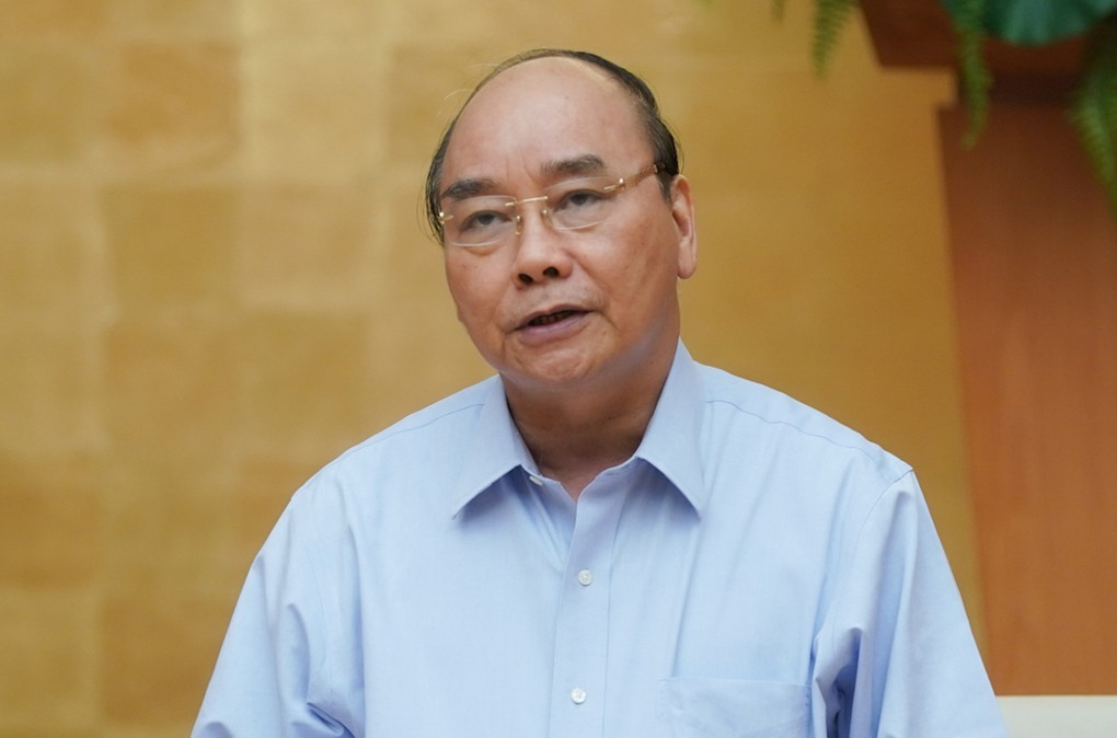 Thủ tướng Nguyễn Xuân Phúc chủ trì họp Thường trực Chính phủ, chiêu 28/4. Ảnh: VGP